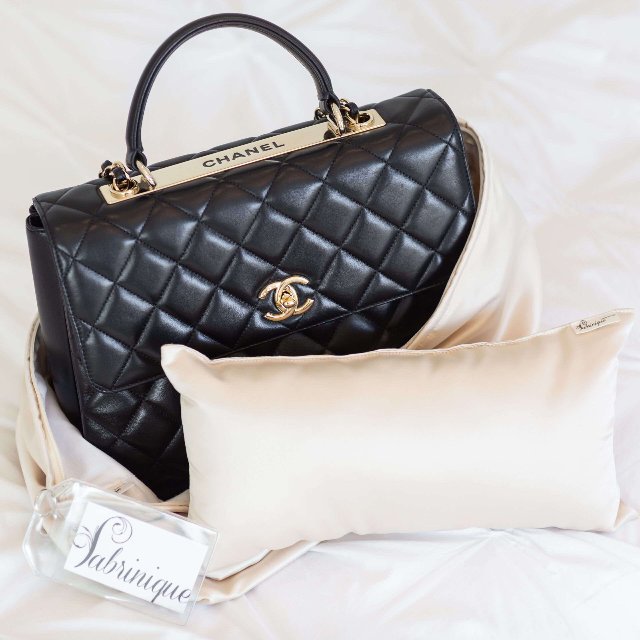 Chanel bag in purse duster