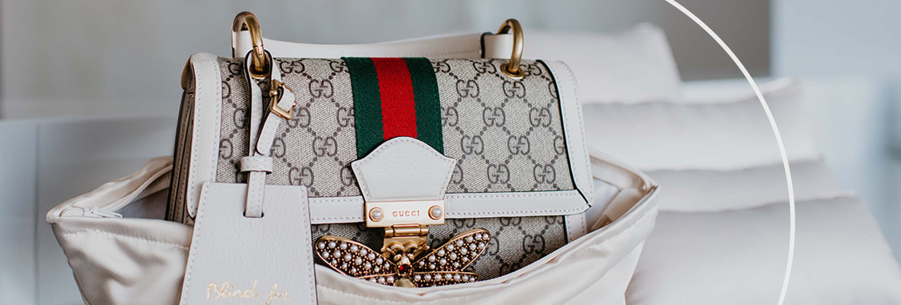 Gucci bag in purse duster